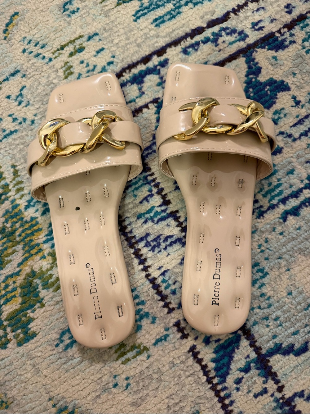 Pierre Dumas Beige Patent Slide Sandals with Gold Chain Accent